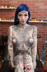 naked girl getting tattoo. Photo #5
